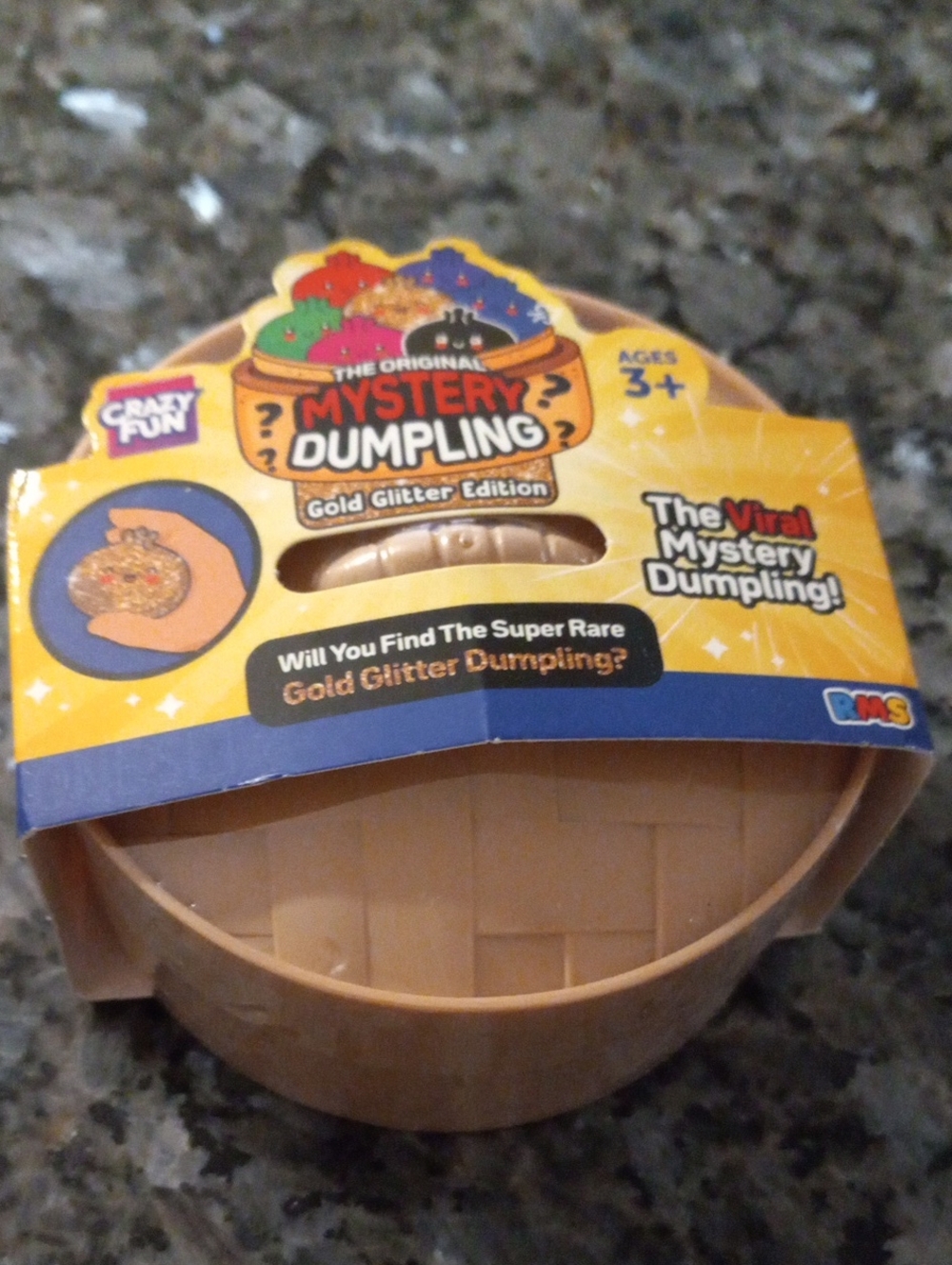 Mystery Dumpling Gold Glitter Edition Toy - Yellow Packaging